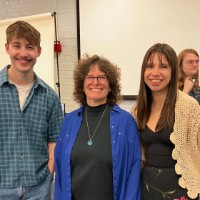 Suzanne Zach with two of her students.